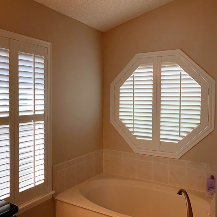 Octagon shutter in a bathroom.