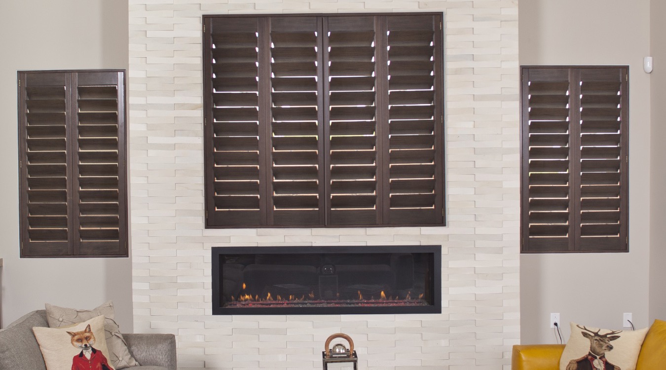 Natural Wood Shutters By Fireplace