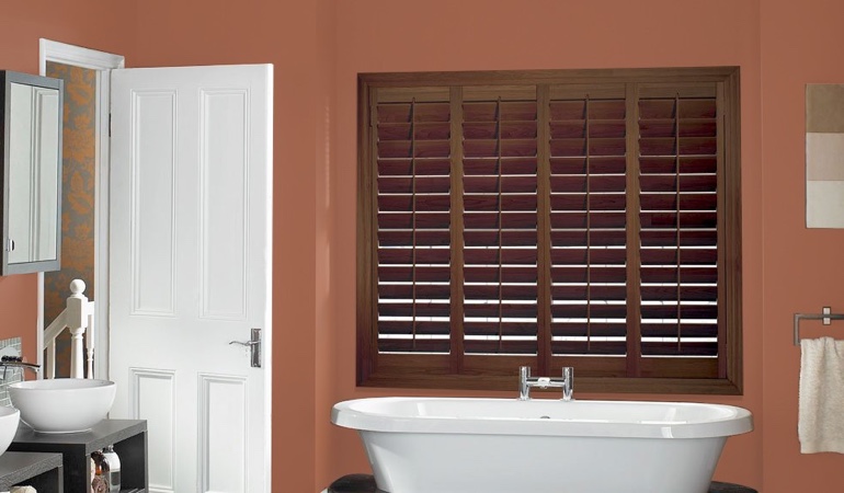 Put old paint to proper use and give your rooms a new life. Plantation window treatments in a bathroom