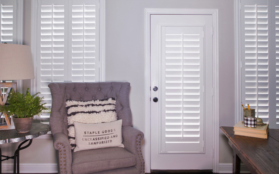 Interior shutters are beautiful and durable window treatments for glass doors in Raleigh. Polywood shutters on a door