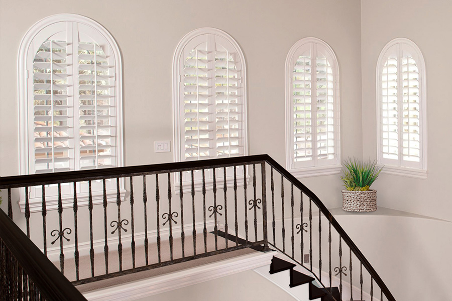 Special shaped arch windows above a stairwell.