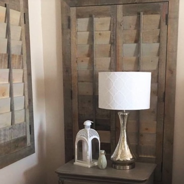 Reclaimed wood shutters in corner