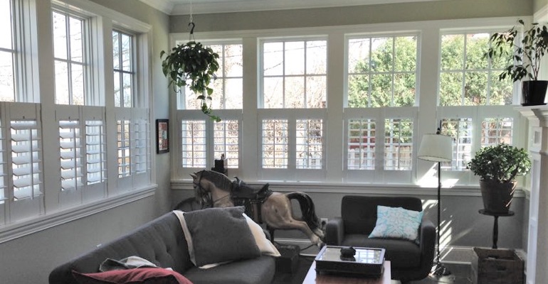Cafe shutters in a living room in Raleigh. Raleigh cafe shutters sun room