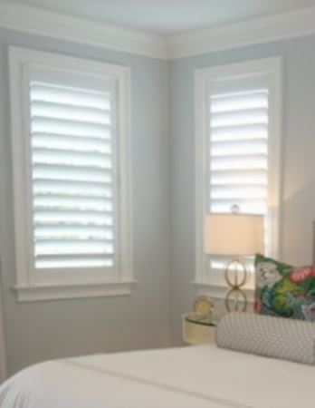 Hidden tilt rod shutters open. White plantation shutters with hidden tilt rods in Raleigh