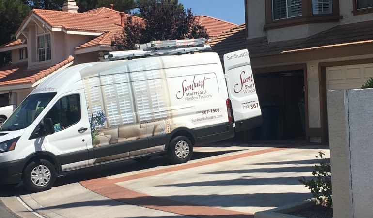 During an in-home consultation, we bring the showroom to your room. Alt text: Sunburst Shutters van in customer's driveway.