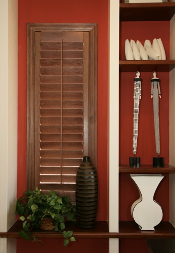 You can even coordinate your wood shutters with shelving. Raleigh wood shutter shelving