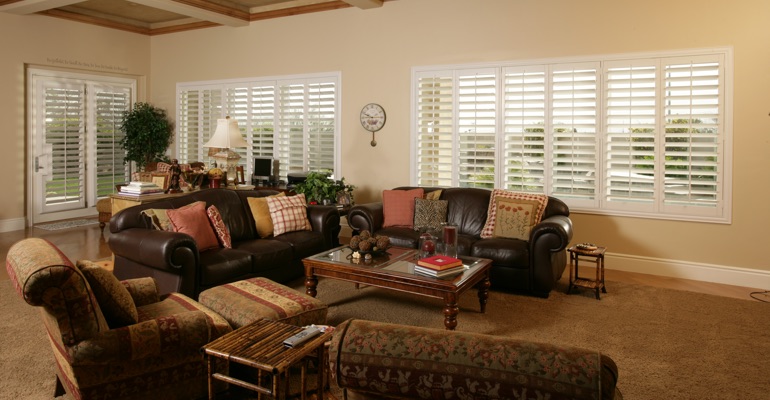 Shutters can let in as much light as you need. Raleigh family room with custom shutters.