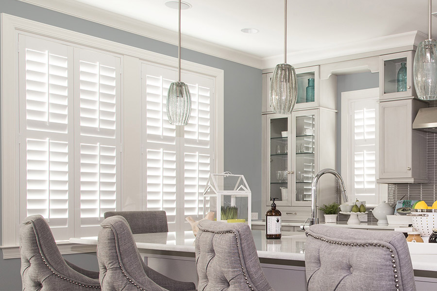 White Polywood shutters are resilient against the humidity White Polywood shutters in a large modern kitchen
