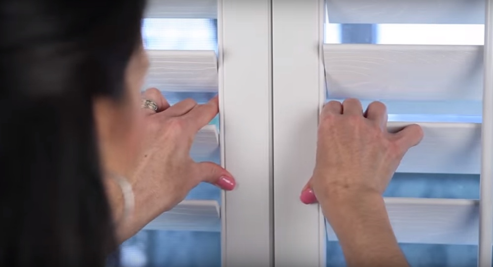 Closing The Panels Of Your Energy Efficient Shutters In Raleigh, NC Shutting plantation shutters